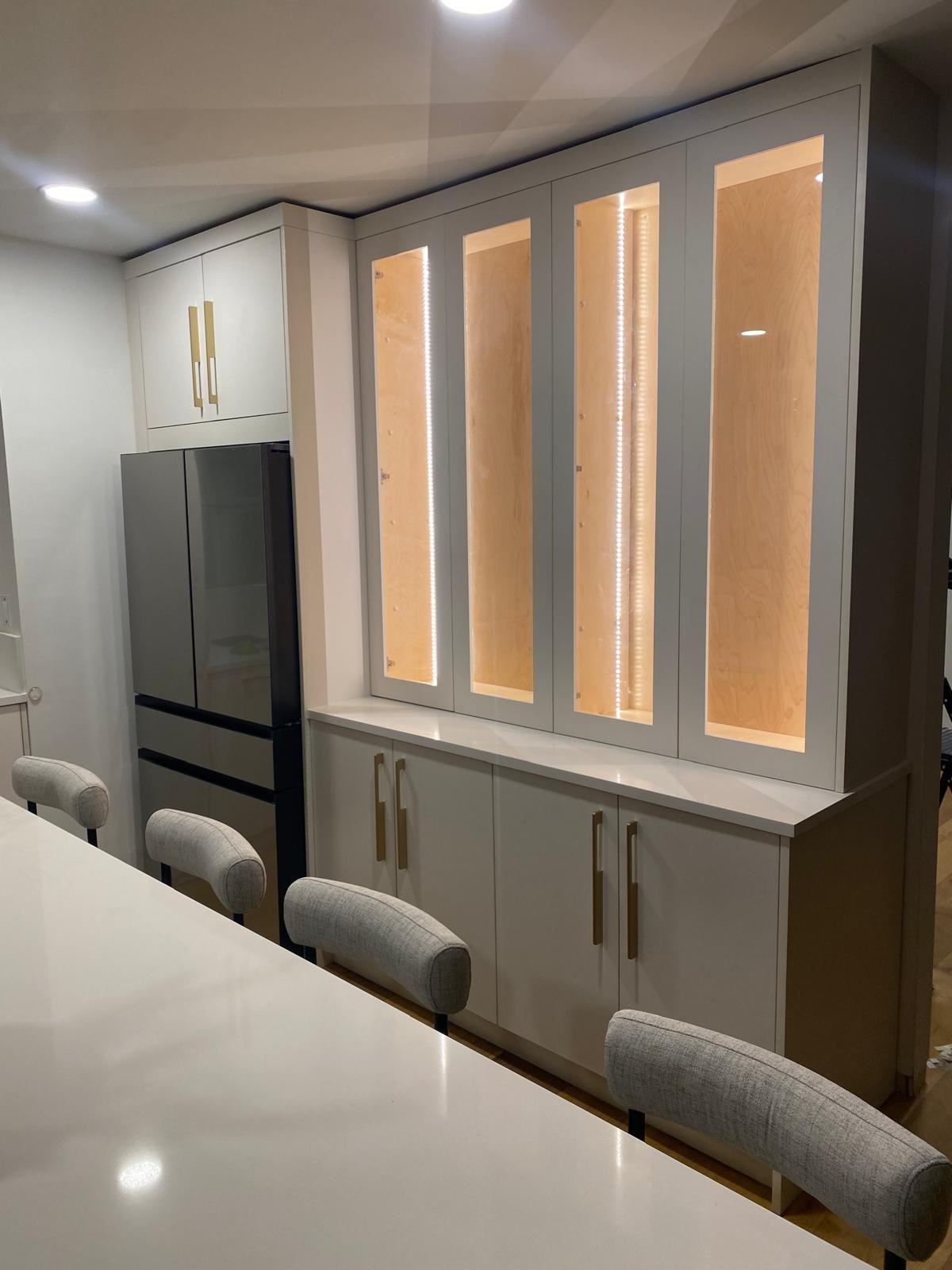 Detailed custom carpentry cabinetry built by Maylin